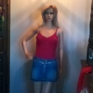 3 item outfit, camisole top, denim mini skirt And silver chain belt ensemble.